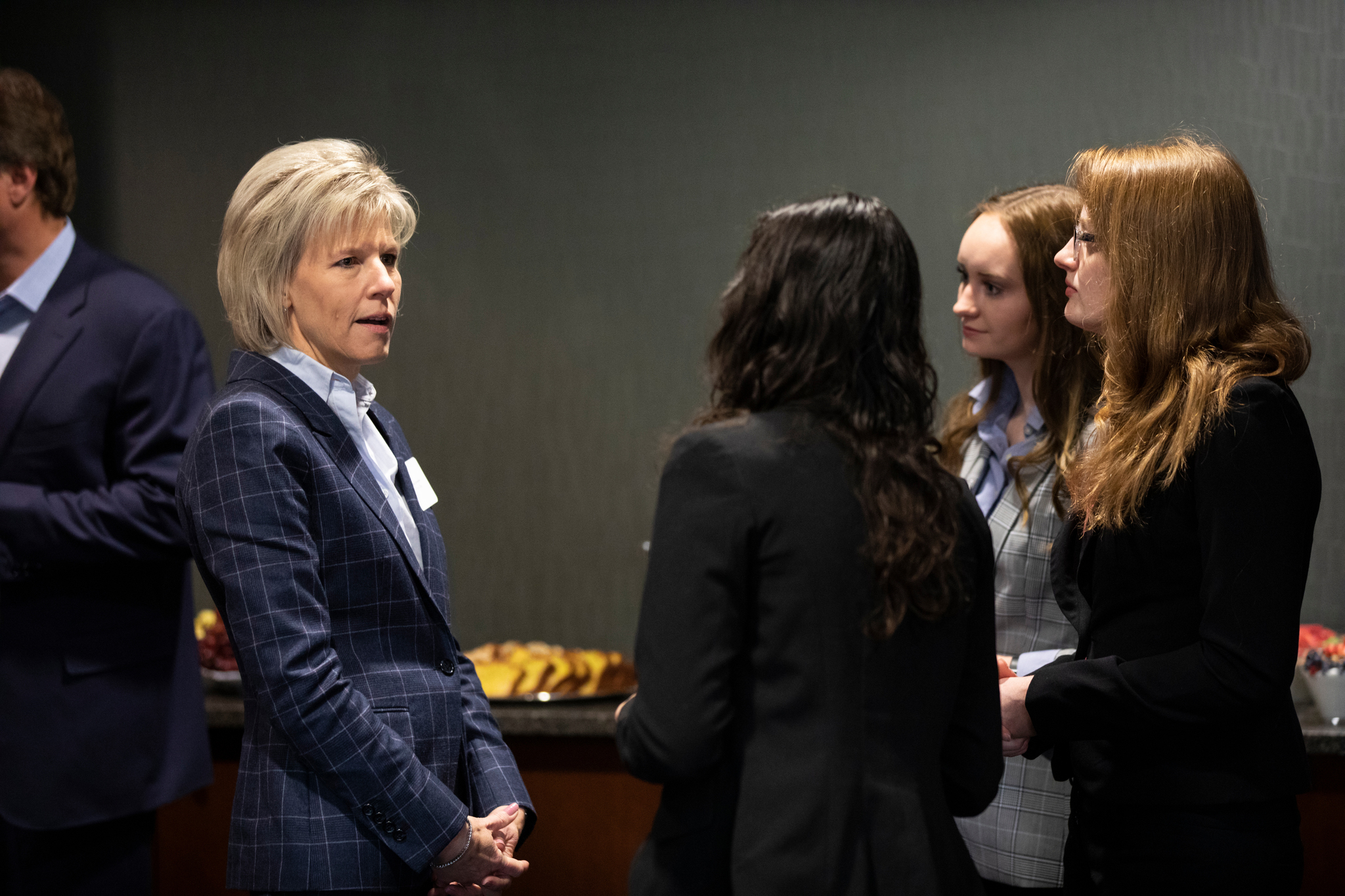 Deb Schoneman, President of Piper Jaffray, speaks with students during the GHR Fellows Advisory Council meeting in the Iversen Hearth Room in the Anderson Student Center on November 15, 2019, in St. Paul.
