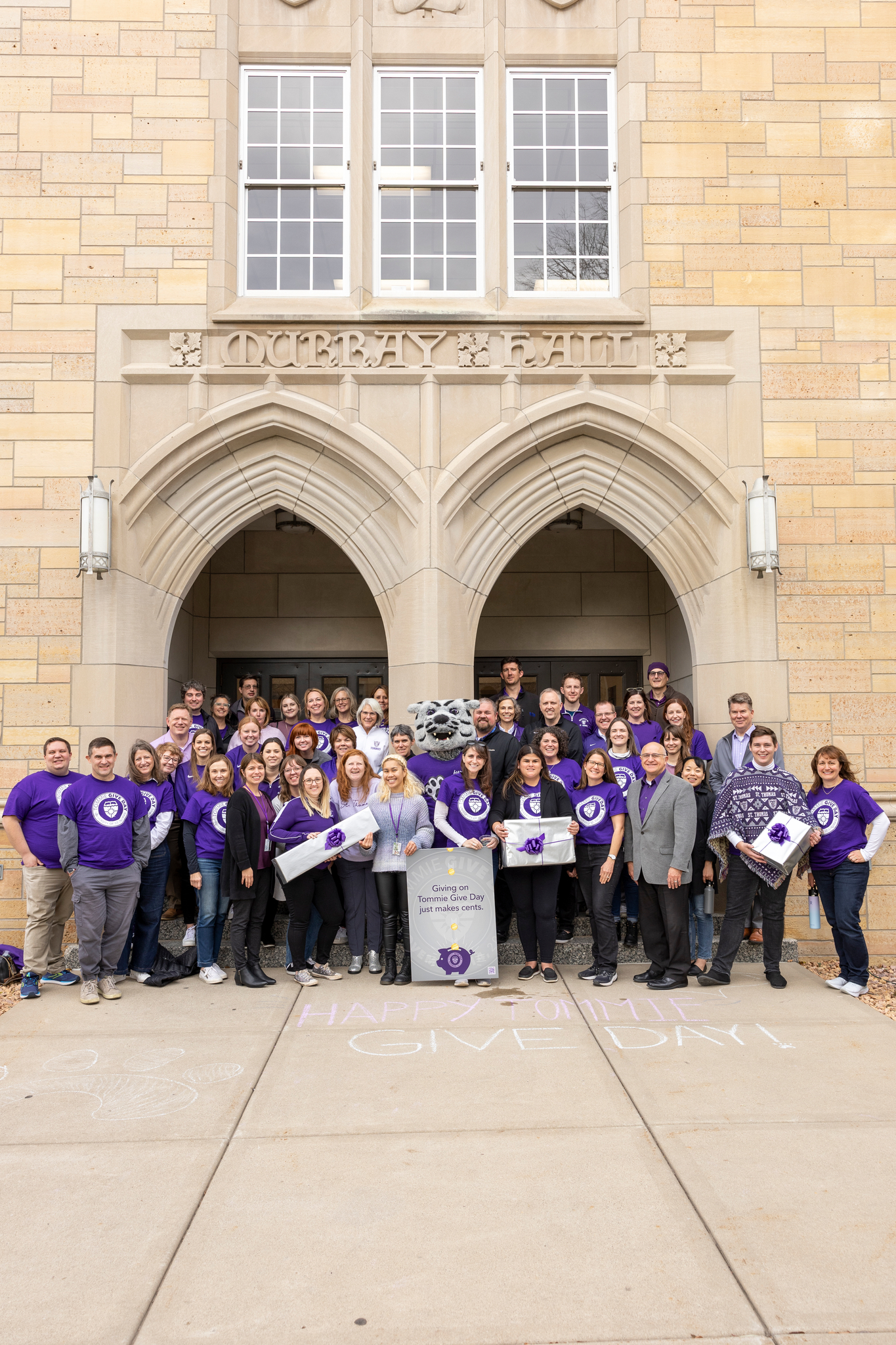 A group of staff members posing for a group picture on Tommie Give Day