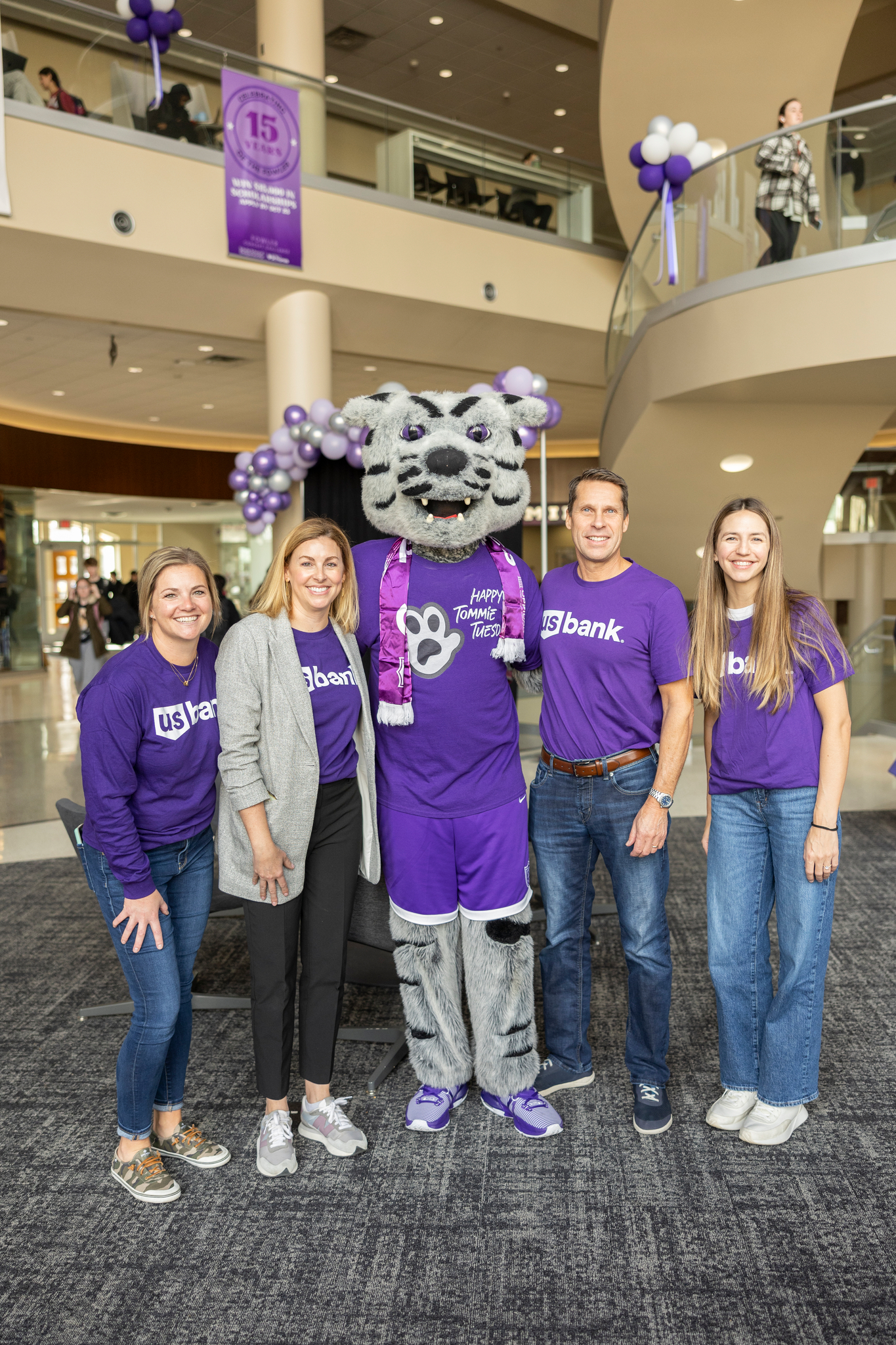 U.S. Bank representatives and Tommie taking a group photo in the Anderson Student Center