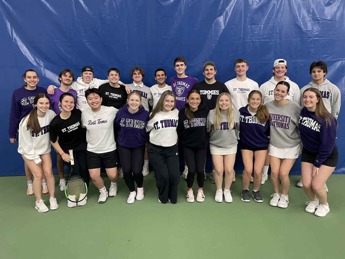 The St. Thomas Club Tennis team gathered at a 2025 practice smiling