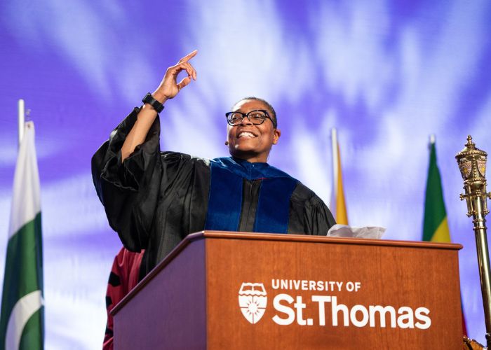 Dean Buffy Smith at a podium during a Commencement Ceremony for DFC