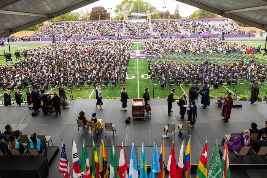 An overhead view of graduates at commencement