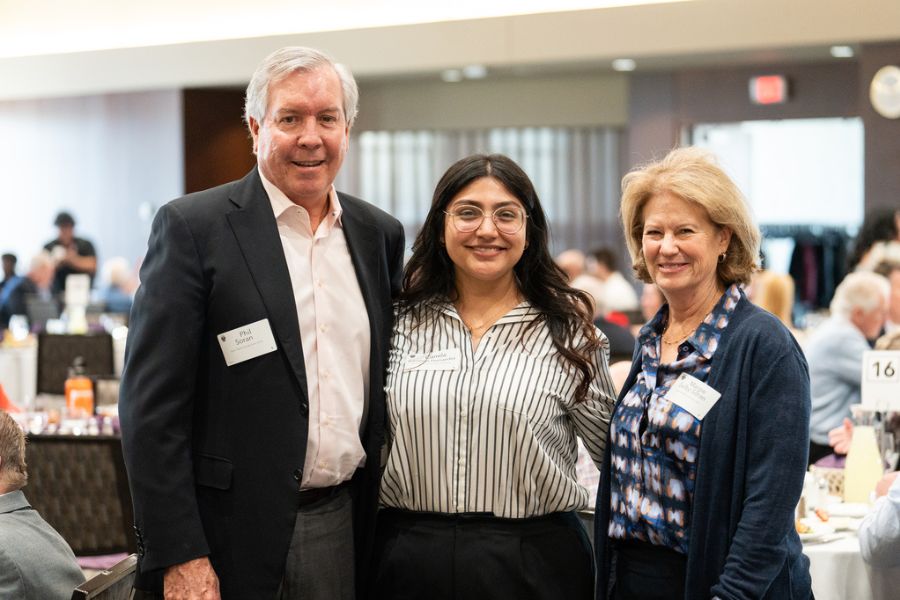Donors, students, staff and faculty attend the 2024 Scholarship Spotlight luncheon in Woulfe Alumni Hall on April 25, 2024, in St. Paul.  Pictured: Camila Barcenas Hernandez with the Sorans.