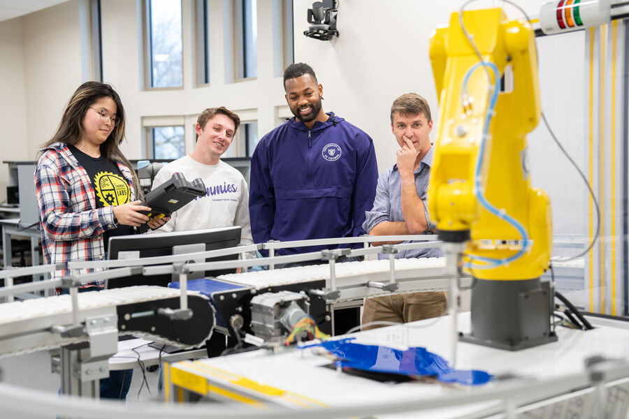 Students gather in the Blattner Robotics and Automation Lab in Schoenecker Center