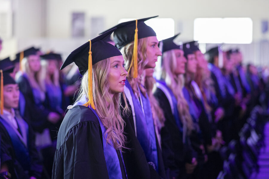 Students in a row at commencement