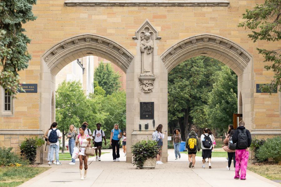 Students walk through the Arches on the first day of fall semester classes on September 5, 2023, in St. Paul.