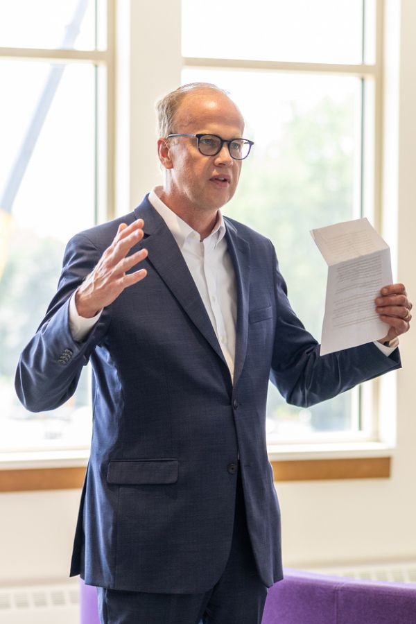 Rick Olson speaks at a St. Thomas event in Schoenecker Center