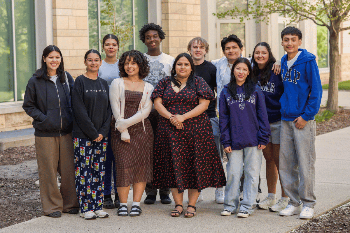 A group of Dougherty Family College student pose for a photo on the Minneapolis campus.