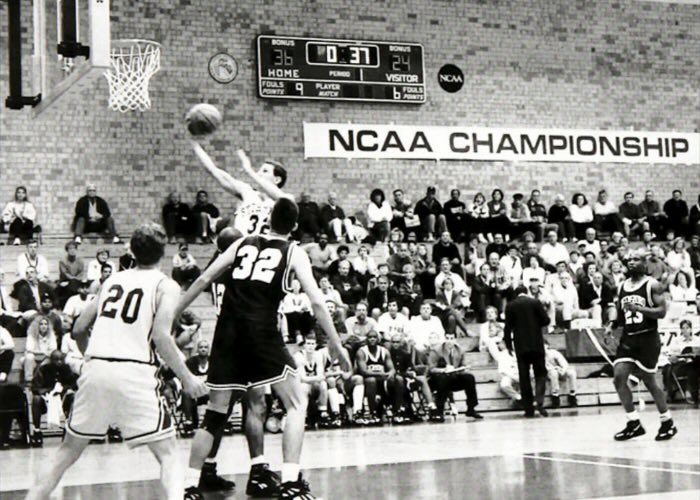 In 1994, St. Thomas men’s basketball made it to the NCAA Division III Final Four, hosted in Buffalo, New York. A member of that team, Brent Longval, reconnected his former roommate, Brett Keith, with St. Thomas in 2021. In this 1994 photo, Longval goes to the basket in the section final – Elite Eight – round. Tommies won 84-74 over Greensboro College.