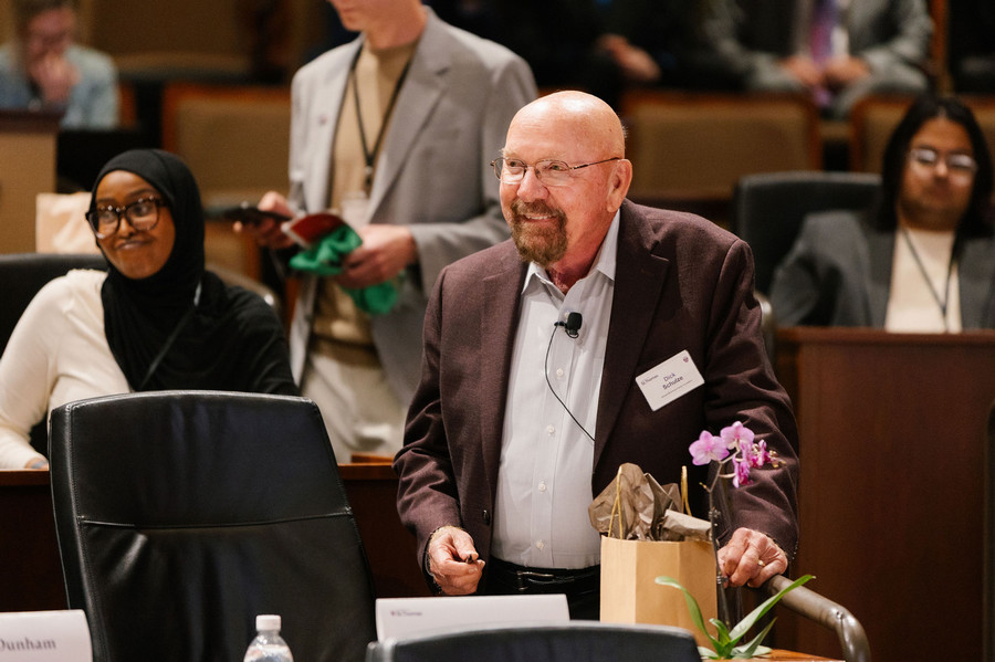 Dick Schulze in the judges’ seating area at e-Fest in April, 2026. e-Fest is one of the nation’s premiere collegiate entrepreneurship events with industry experts serving as judges and thousands of dollars in prizes money awarded to top business ideas in a variety of categories. 