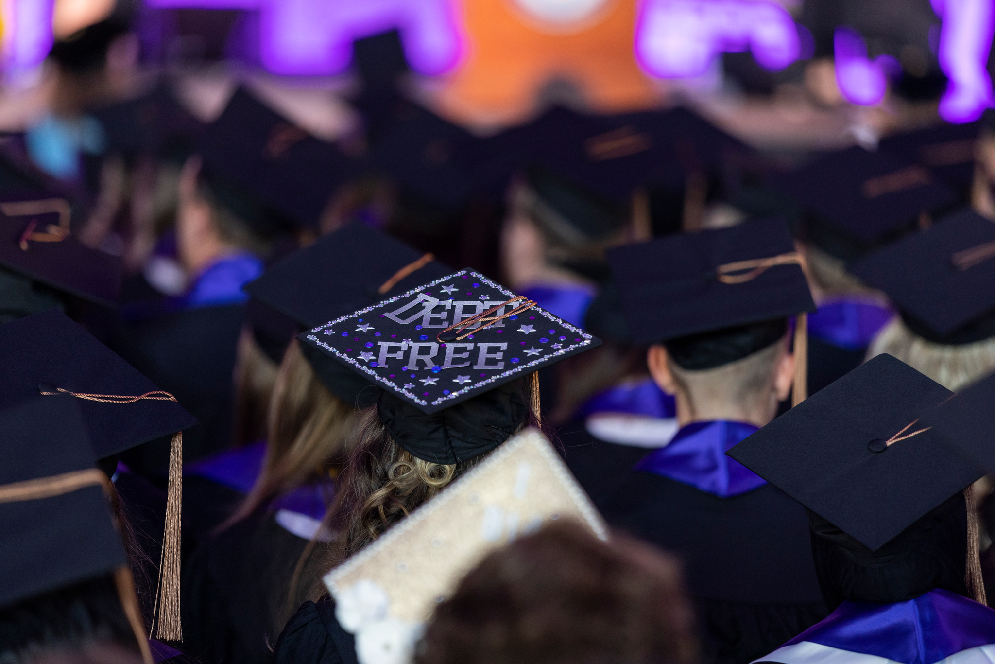 Student’s cap at the 2023 Opus College of Business Undergraduate Commencement Ceremony that says "Debt Free"