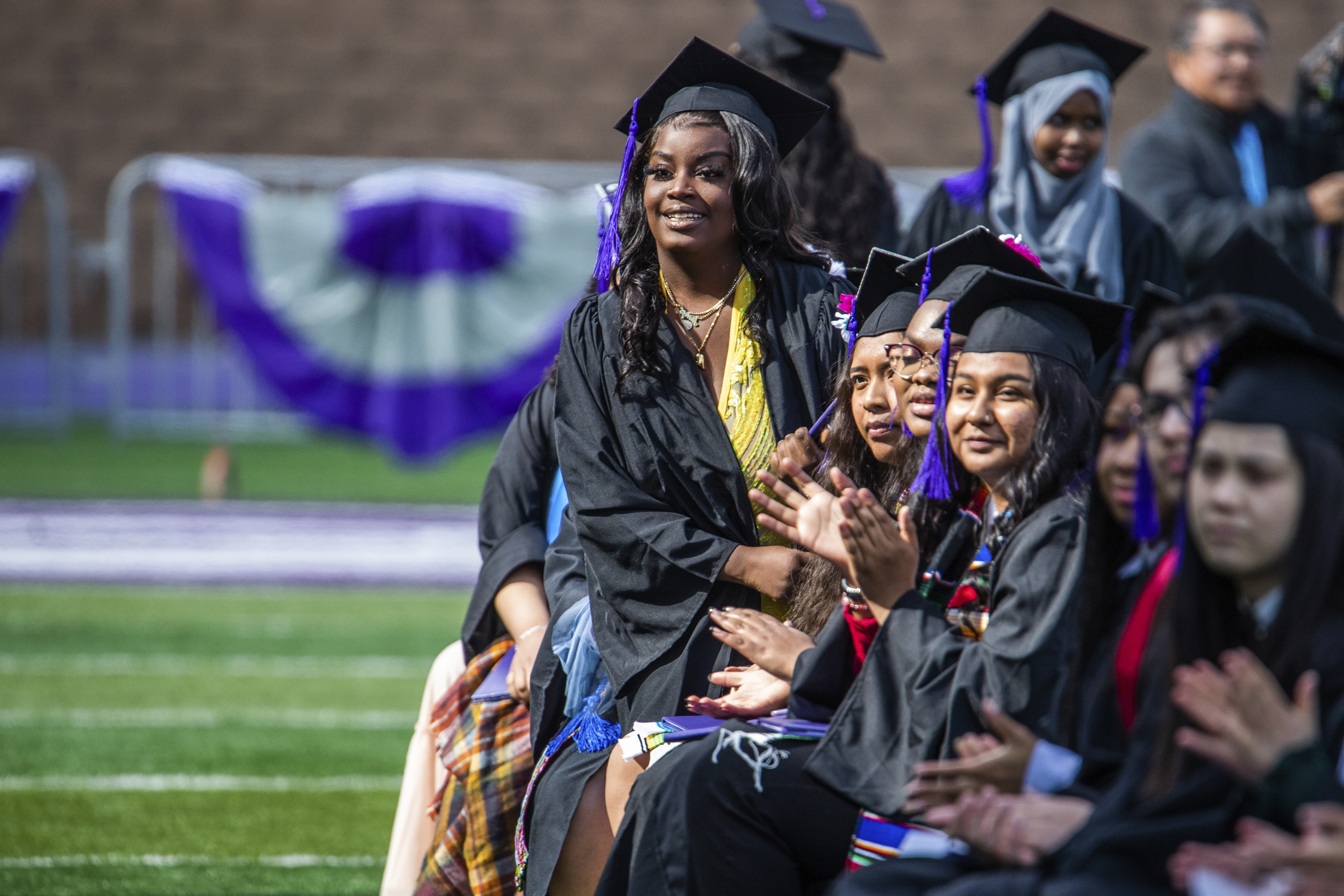 DFC students smiling at graduation