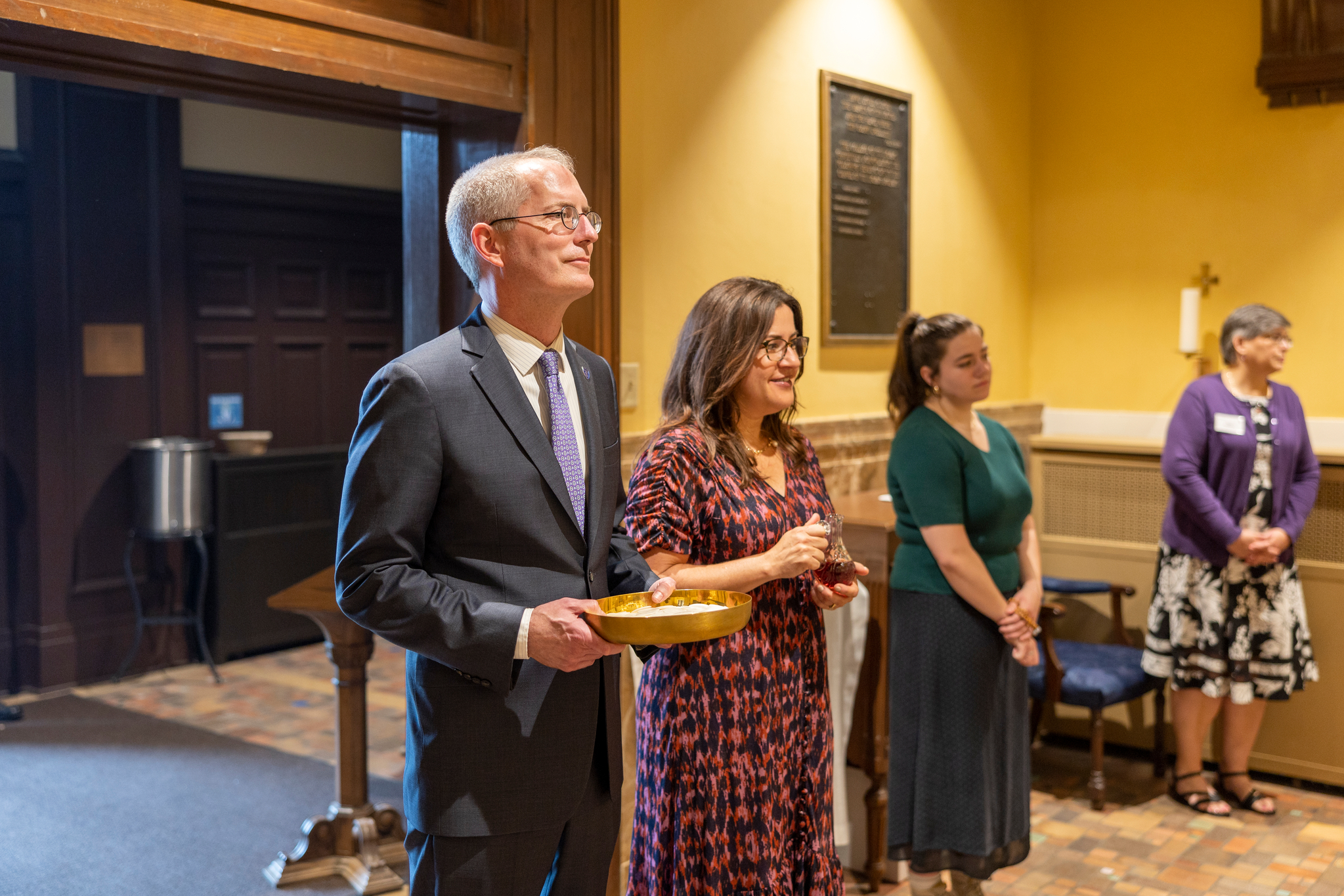 President Vischer and his wife performing the procession of the sacraments