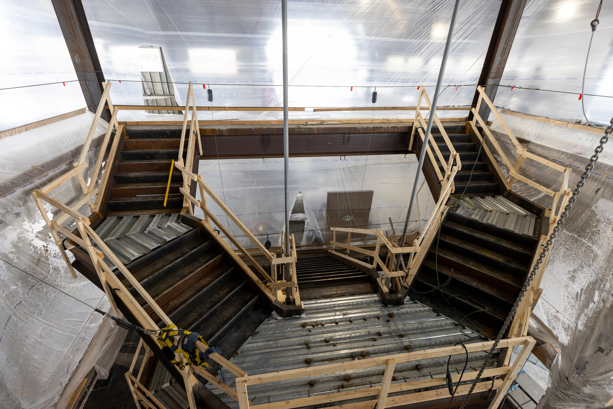 Grand staircase under construction at the Schoenecker Center STEAM complex on south campus