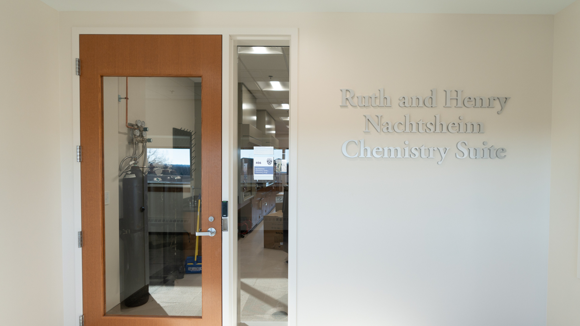 Outside of the chemistry suite with the naming donors on the wall